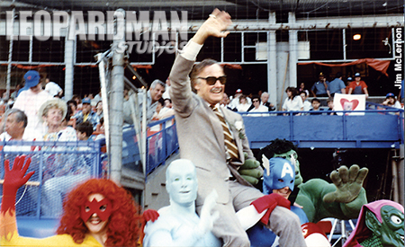 Stan Lee hoisted by Marvel superheroes